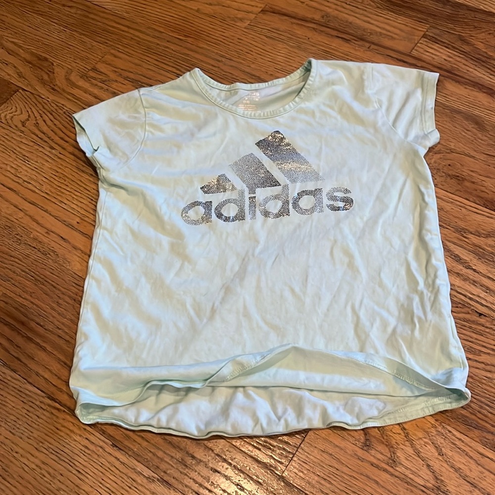 I'm selling a sage and silver tee it's a Small 7/8 made by adidas